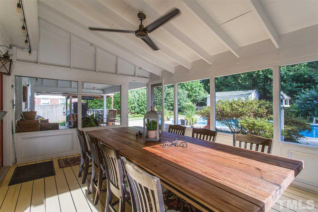 4300 Pike Road Raleigh, NC 27613 - Photo 9 of 28 a view of a dining room with furniture window and outside view