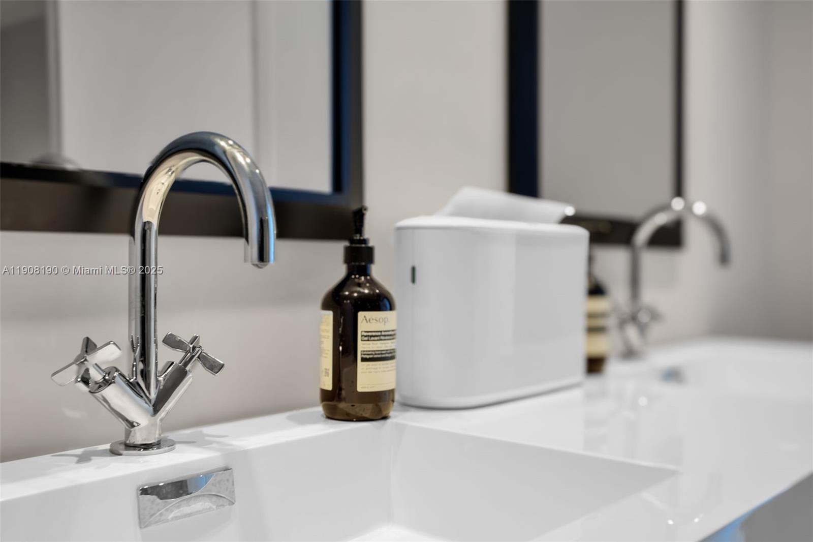 450 Alton Road, Unit 2110 Miami Beach, FL 33139 - Photo 22 of 33 a sink with a faucet