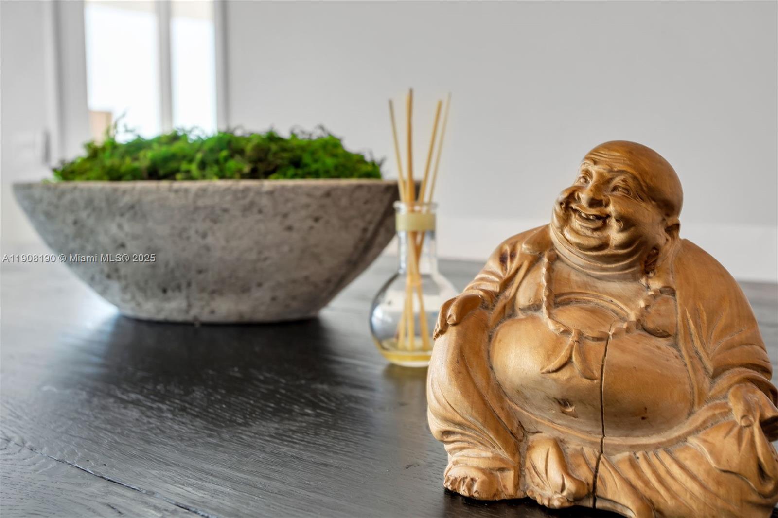 450 Alton Road, Unit 2110 Miami Beach, FL 33139 - Photo 6 of 33 a view of a vase of flowers sitting on a table