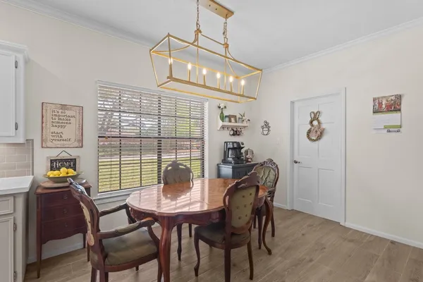 a work room with furniture and windows