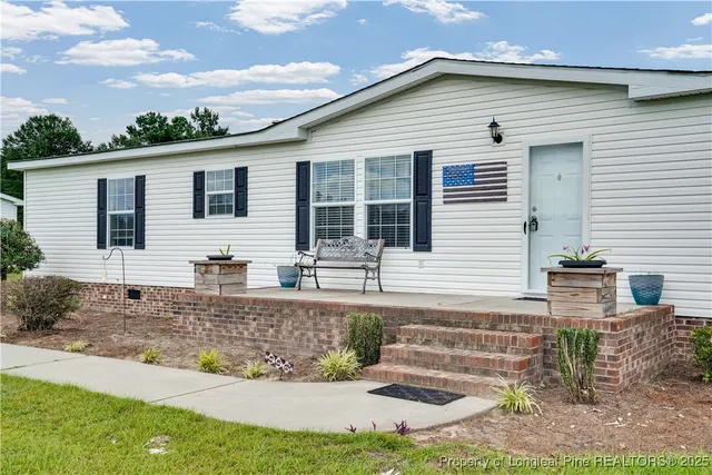 a front view of a house with porch