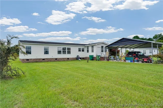 a front view of a house with a garden and porch
