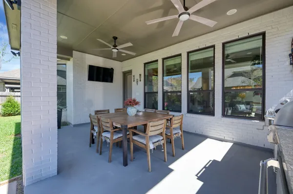 a kitchen with stainless steel appliances a sink and a stove