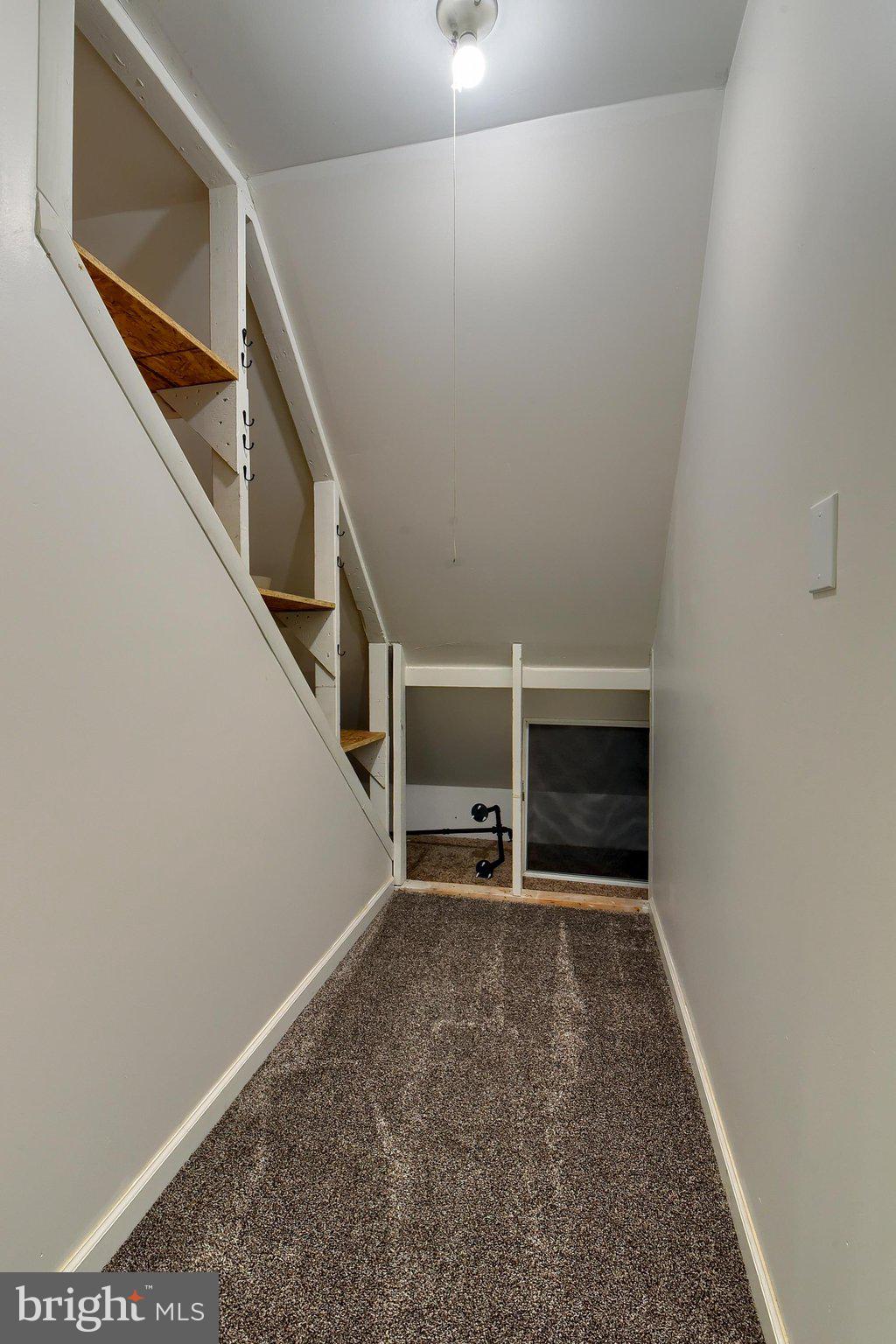 3740 Beagle Road Middletown, PA 17057 - Photo 23 of 70 a view of an empty room with wooden floor and stairs