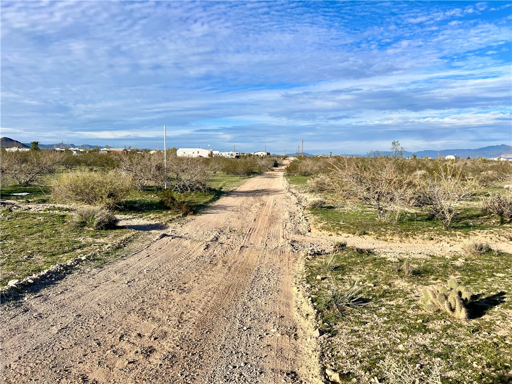 2884 Naco Road Golden Valley, AZ 86413 - Photo 6 of 14 View of street featuring a view of rural / pastoral area