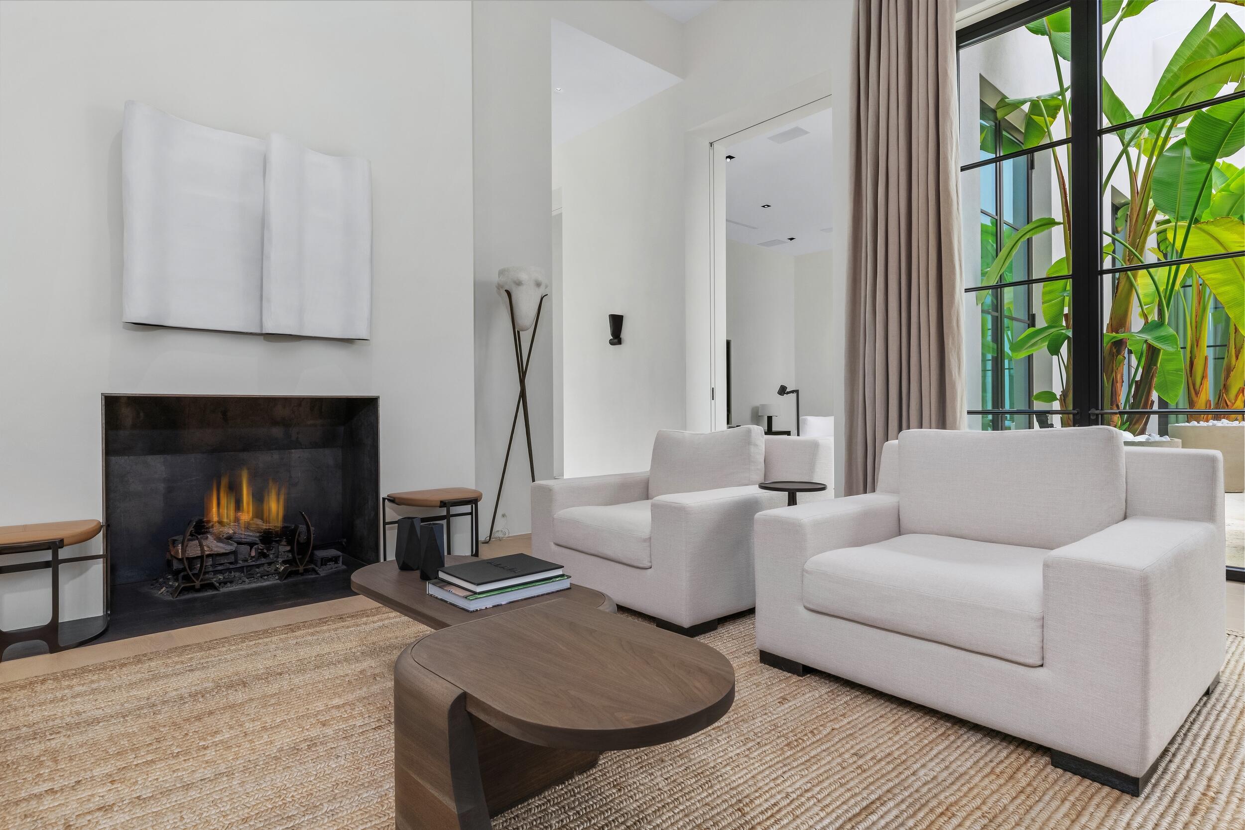 241 Jungle Road Palm Beach, FL 33480 - Photo 13 of 96 a living room with furniture and a fireplace