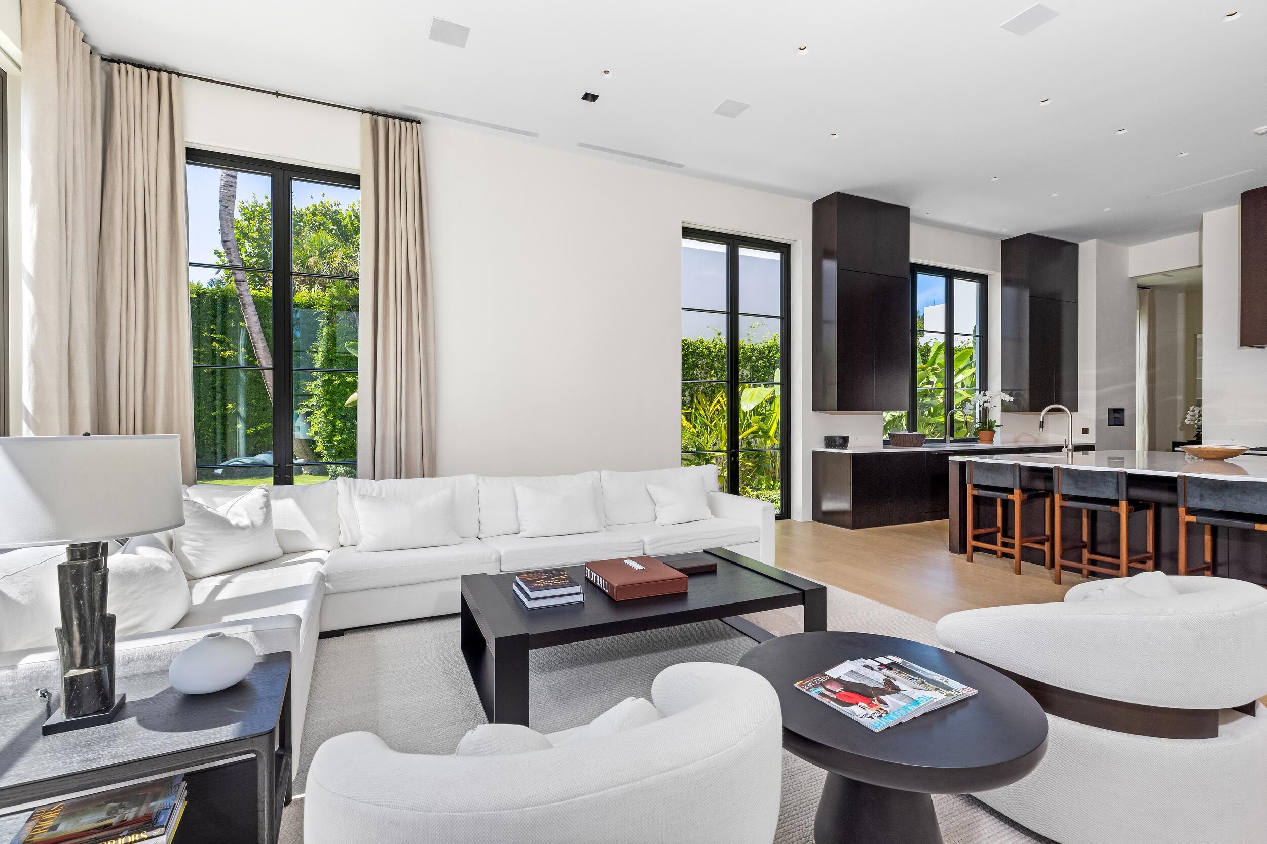 241 Jungle Road Palm Beach, FL 33480 - Photo 33 of 96 a living room with furniture and a large window