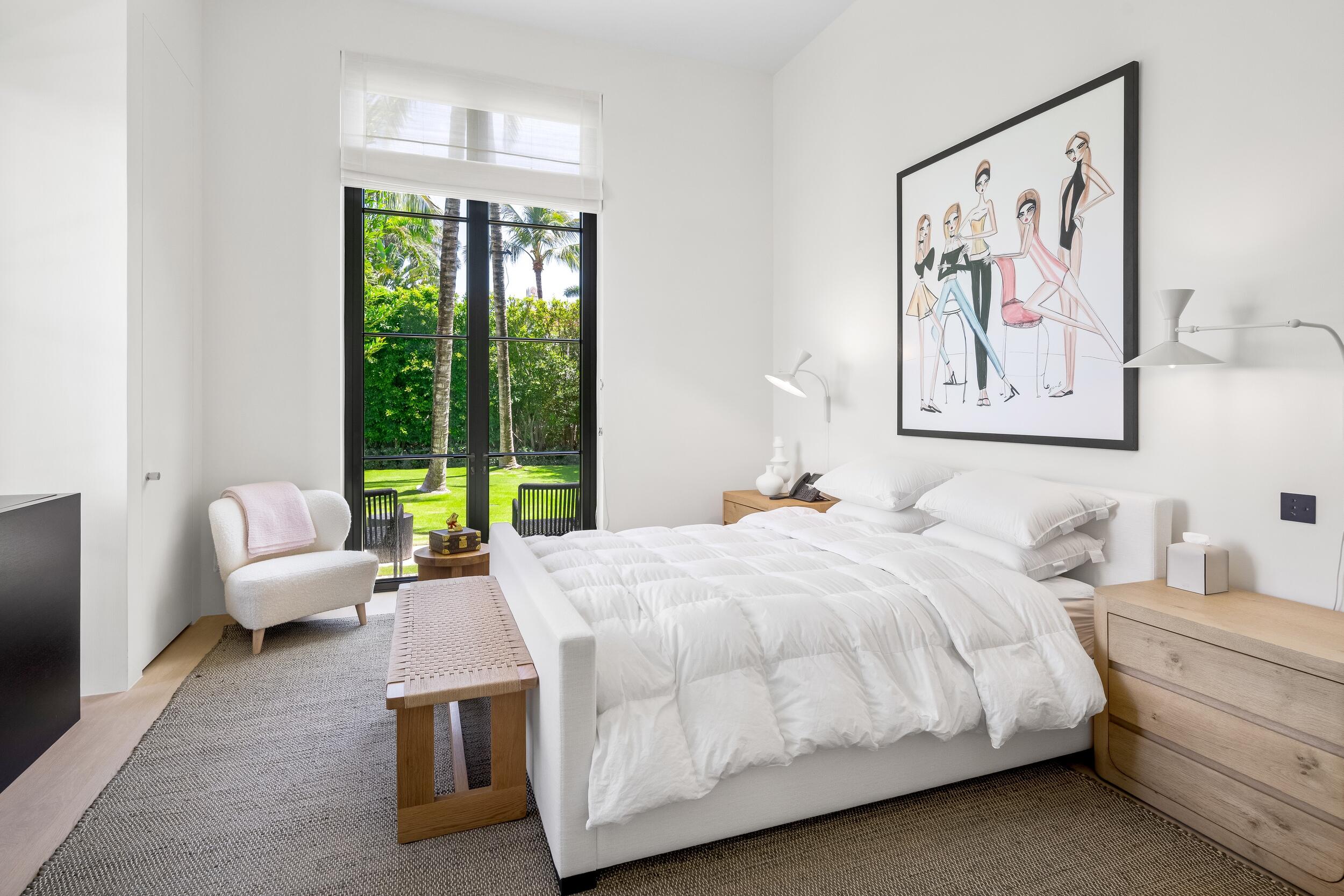 241 Jungle Road Palm Beach, FL 33480 - Photo 60 of 96 a bedroom with a bed and a large window