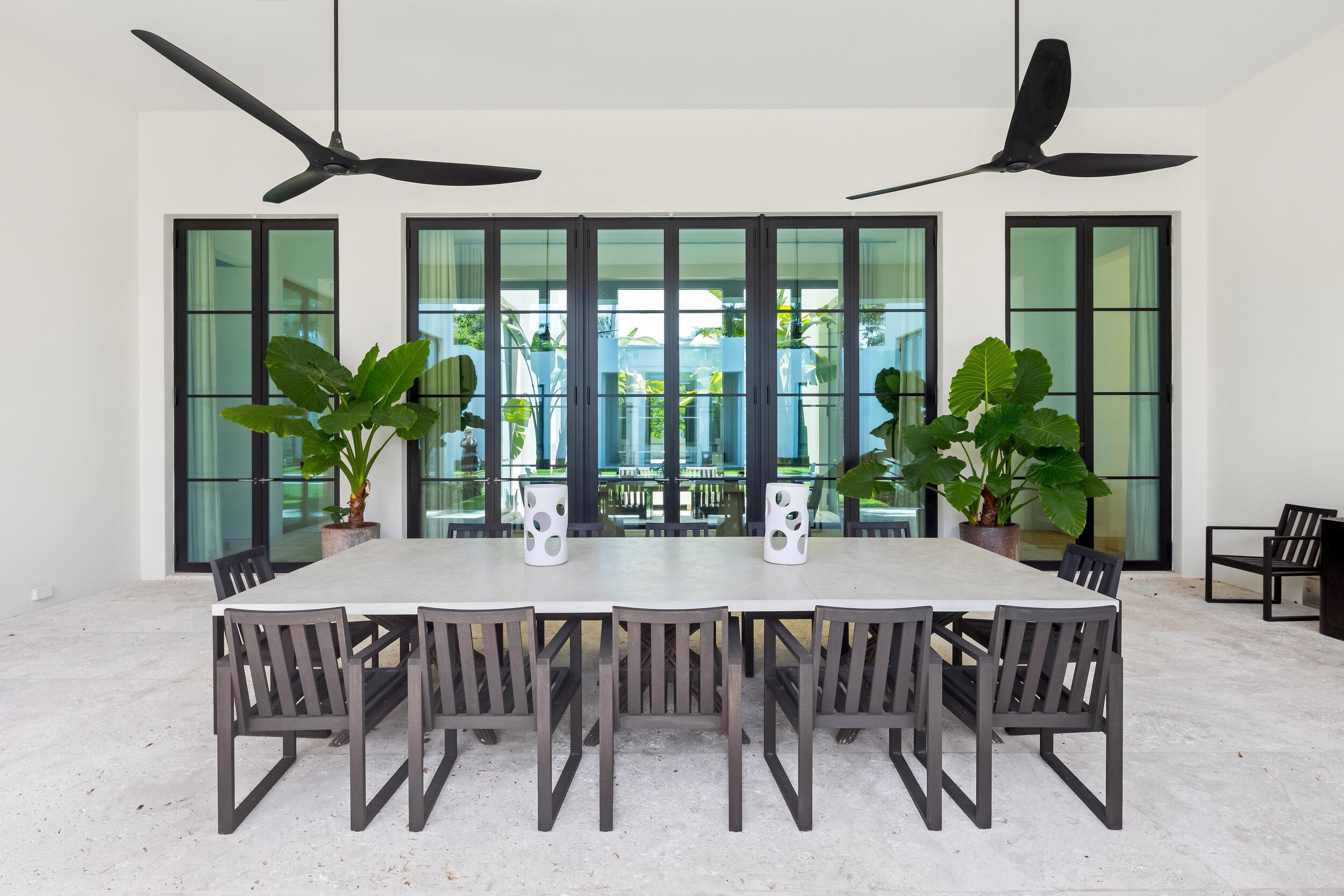 241 Jungle Road Palm Beach, FL 33480 - Photo 66 of 96 a view of a dining room with furniture window and outside view
