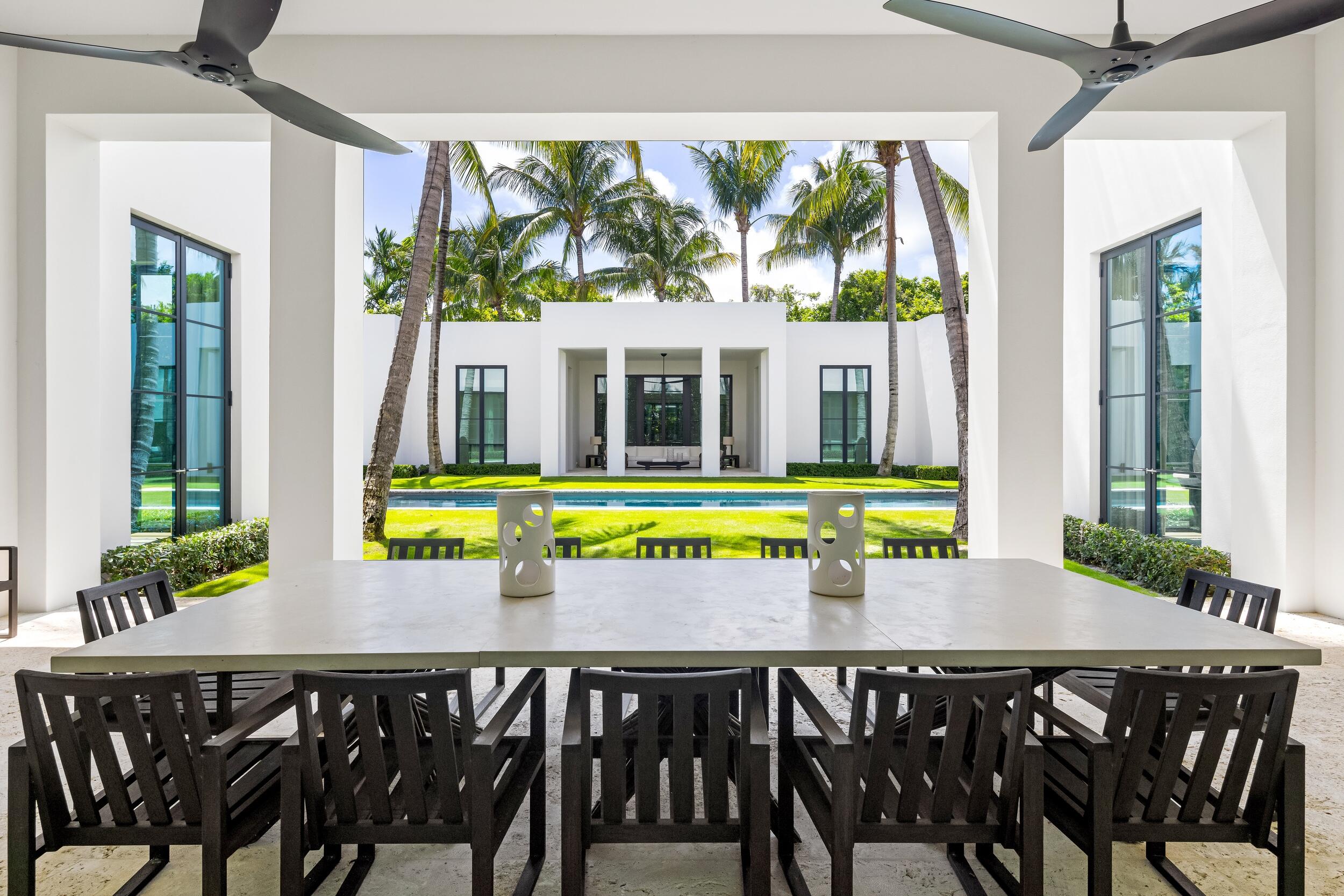 241 Jungle Road Palm Beach, FL 33480 - Photo 67 of 96 a view of a dining room with furniture window and outside view
