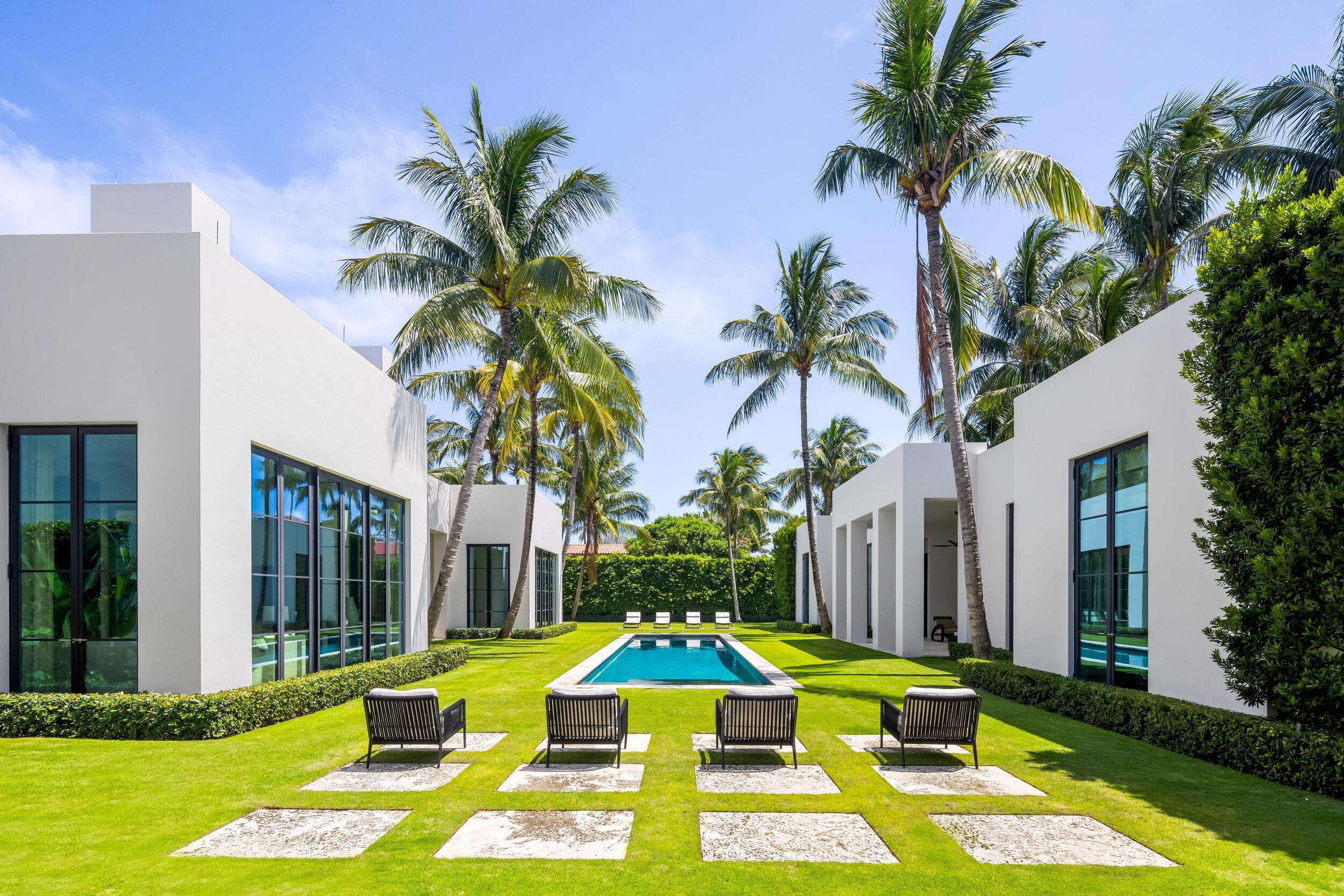 241 Jungle Road Palm Beach, FL 33480 - Photo 75 of 96 a view of a house with swimming pool and sitting area