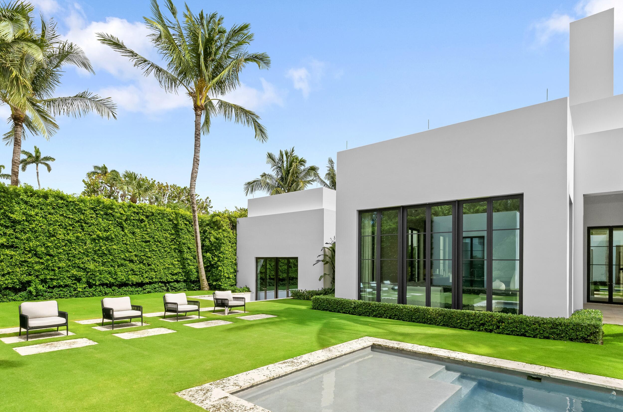 241 Jungle Road Palm Beach, FL 33480 - Photo 79 of 96 a view of a house with backyard and sitting area
