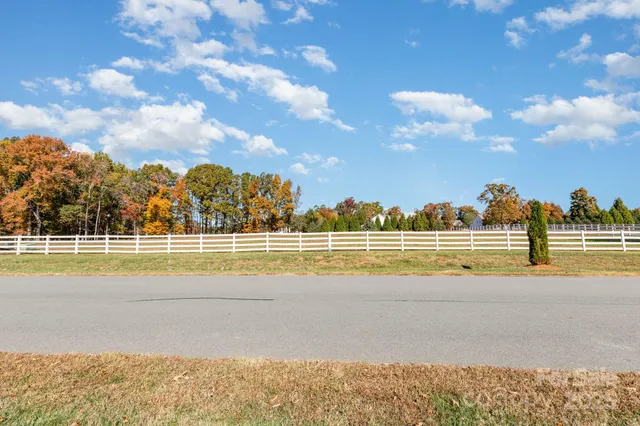 a view of a swimming pool and an outdoor space