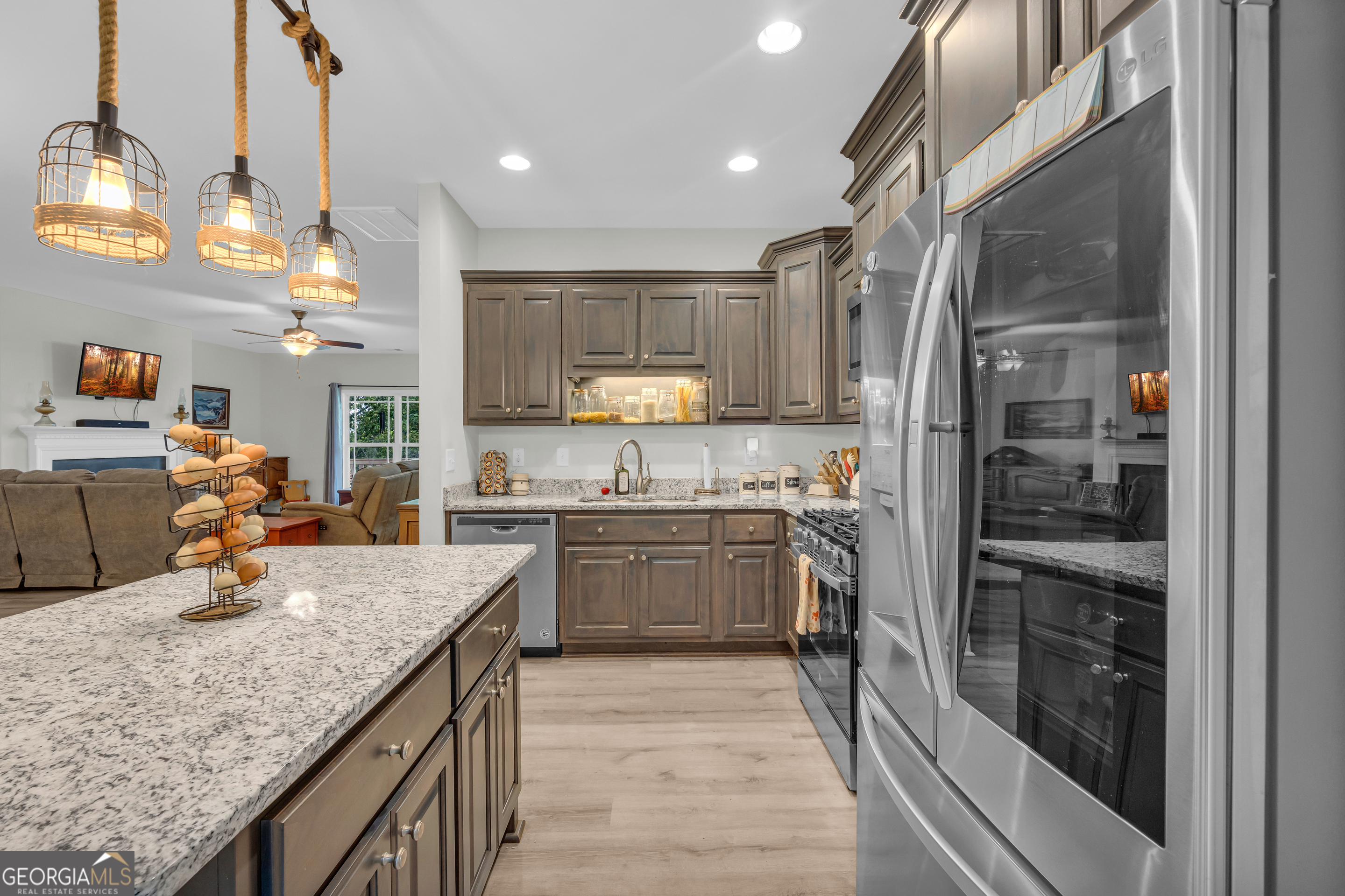945 Hank Fry Road Clarkesville, GA 30523 - Photo 26 of 45 a kitchen with a sink stove and refrigerator