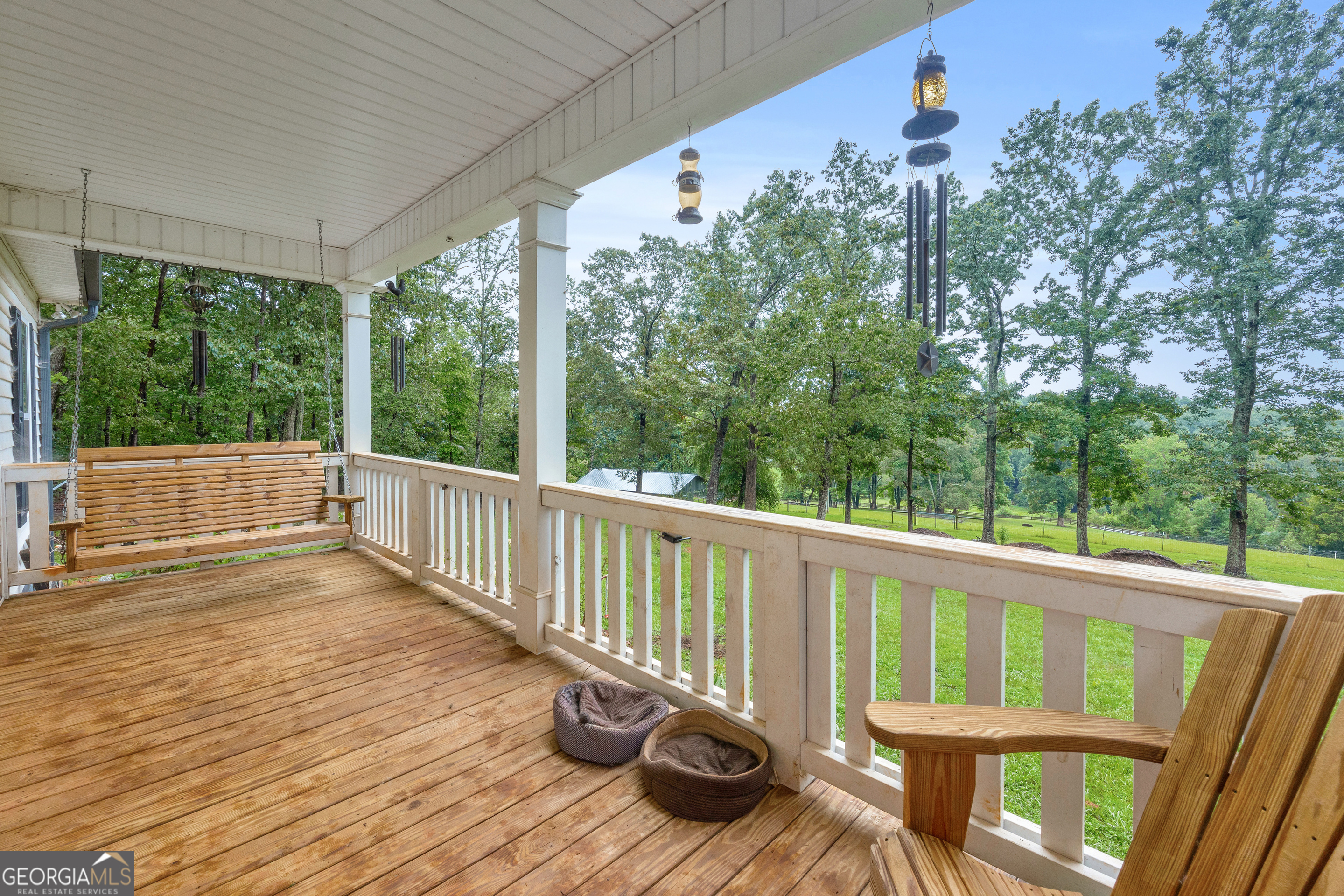 945 Hank Fry Road Clarkesville, GA 30523 - Photo 8 of 45 a view of a two chairs in the balcony