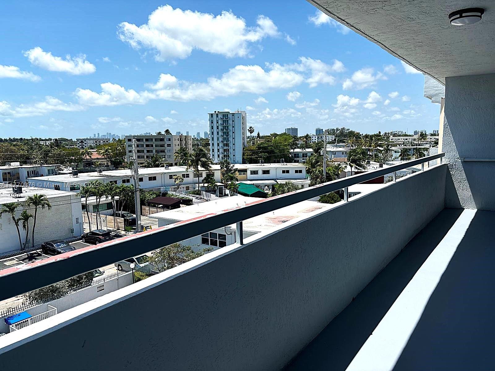 7300 Wayne Avenue, Unit 511 Miami Beach, FL 33141 - Photo 16 of 20 a view of city from a balcony