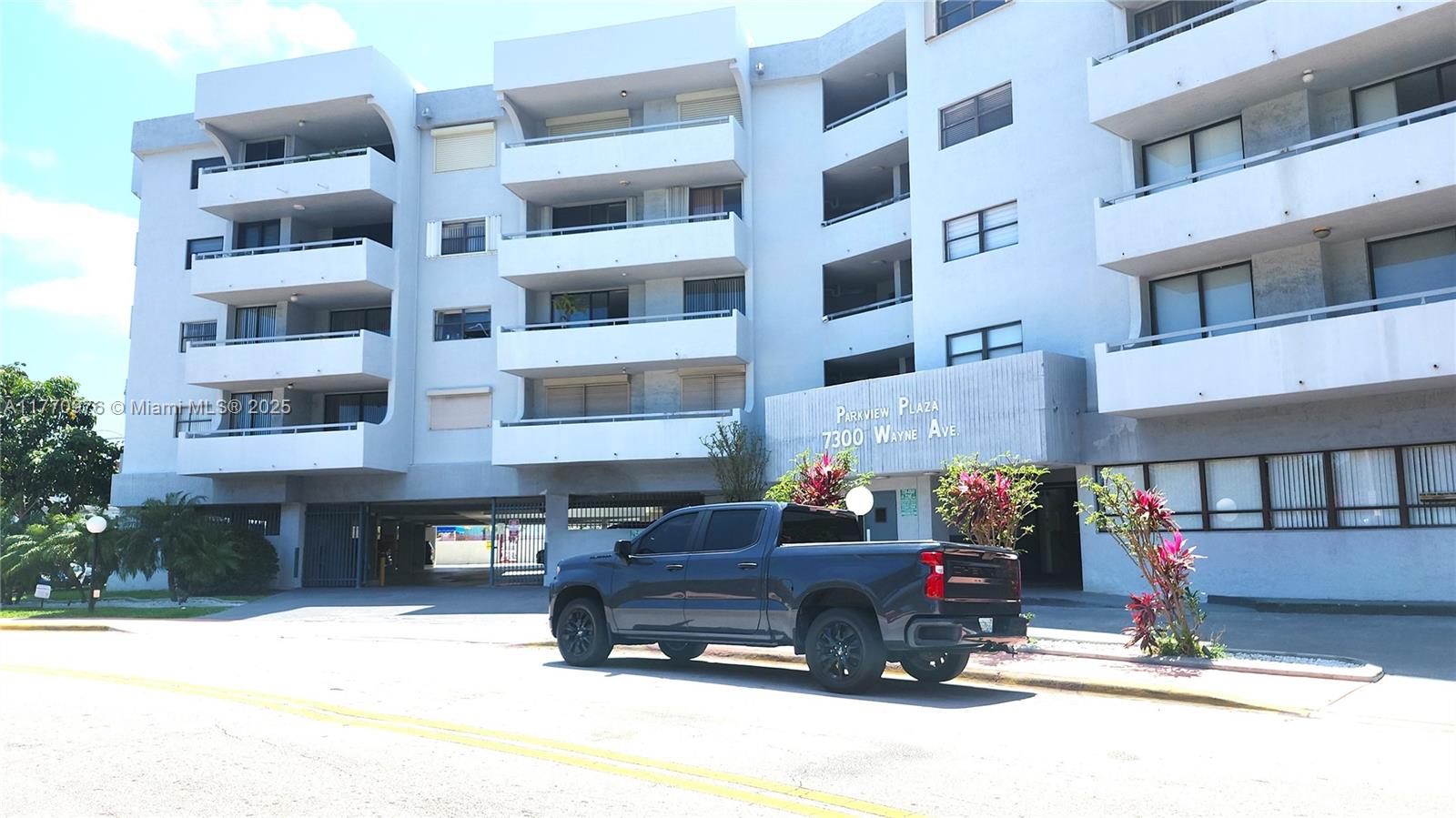 7300 Wayne Avenue, Unit 511 Miami Beach, FL 33141 - Photo 2 of 20 a car parked in front of a building
