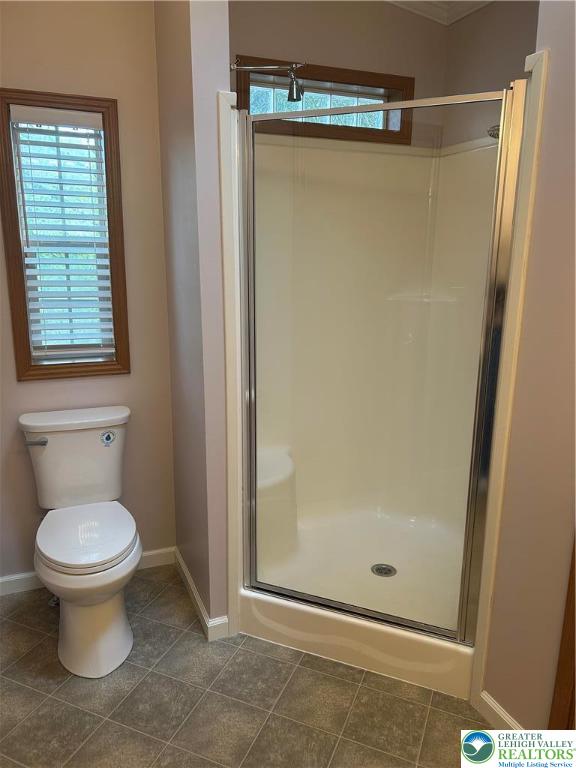 4220 Panther Court Orefield, PA 18069 - Photo 18 of 21 a bathroom with a shower and a toilet