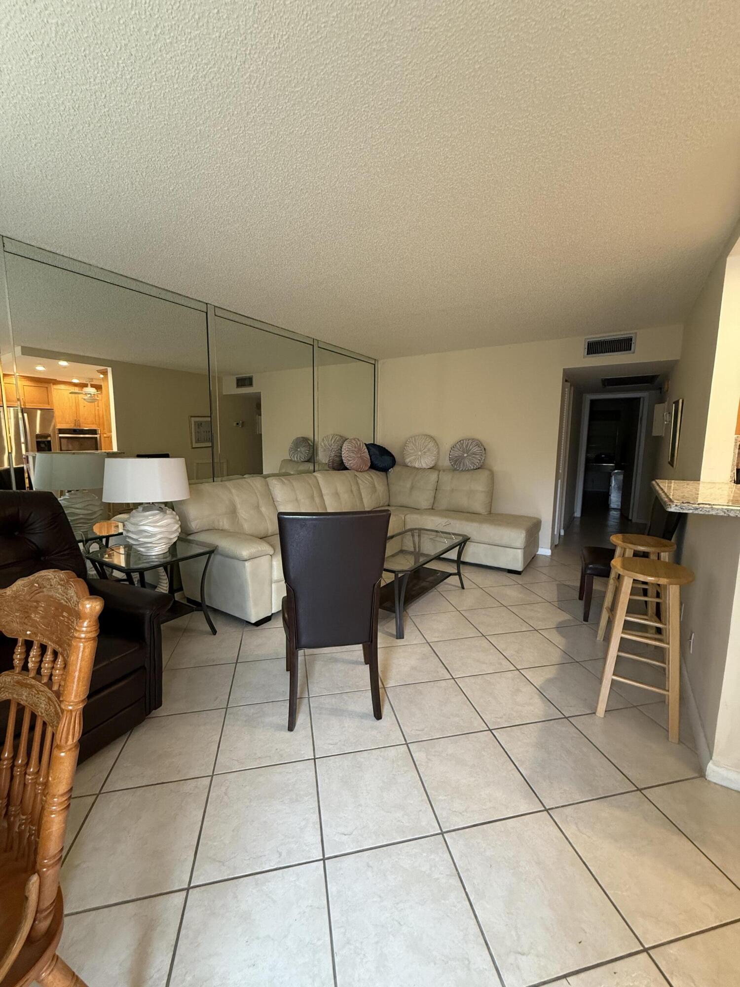 1046 Wolverton C Boca Raton, FL 33434 - Photo 6 of 17 a outdoor space with furniture