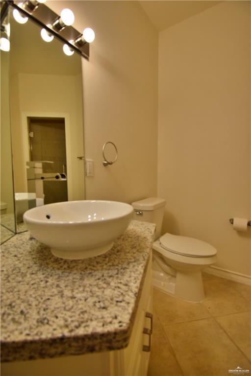 1104 Rio Balsas Mission, TX 78572 - Photo 16 of 20 Bathroom with vanity and light tile patterned flooring
