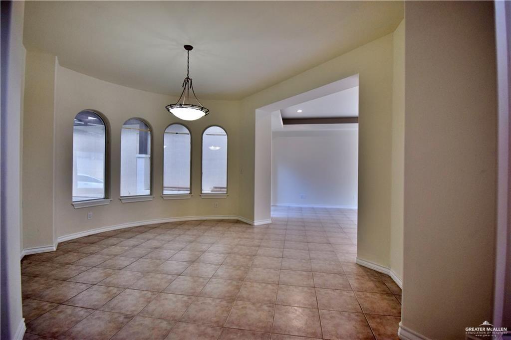 1104 Rio Balsas Mission, TX 78572 - Photo 5 of 20 Unfurnished dining area featuring light tile patterned floors and recessed lighting