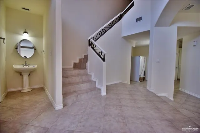 a view of a hallway with staircase