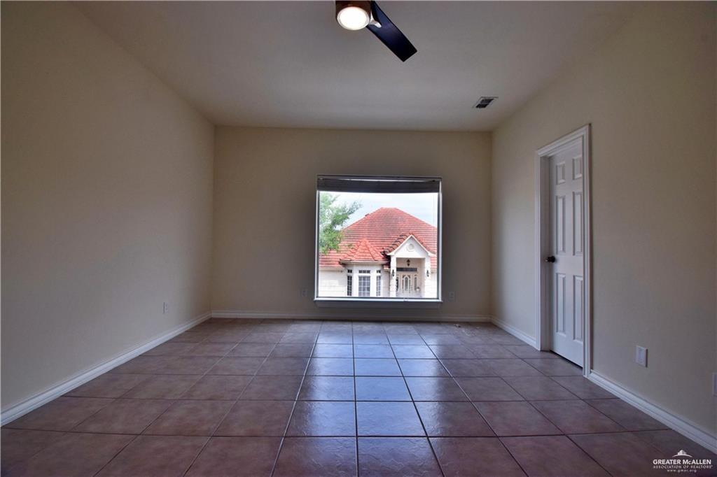 1104 Rio Balsas Mission, TX 78572 - Photo 9 of 20 Spare room with light tile patterned floors and baseboards