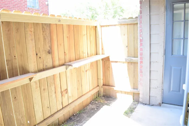 a view of a porch with a bench