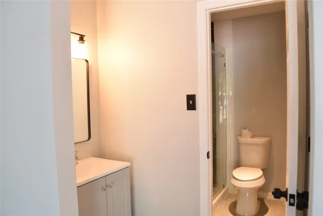a bathroom with a toilet and a sink