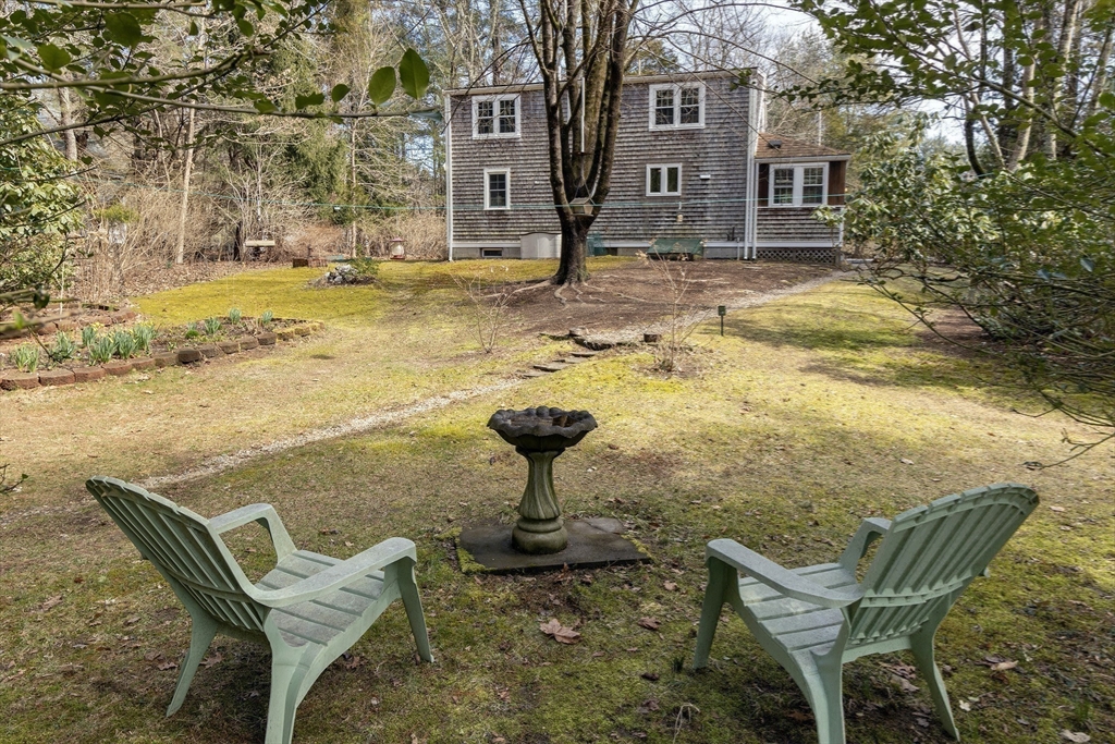 66 Main Street Plympton, MA 02367 - Photo 24 of 31 a swimming pool with some trees in the background