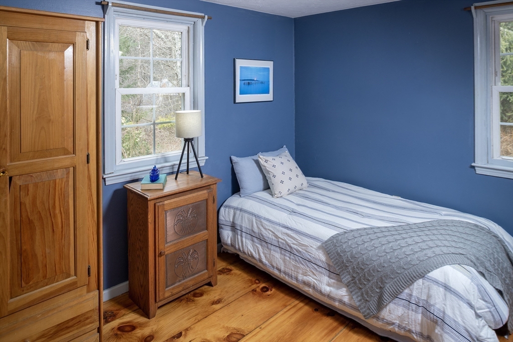 66 Main Street Plympton, MA 02367 - Photo 5 of 31 a bedroom with a bed and a window