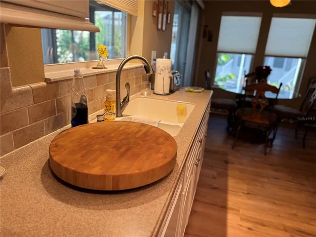 a view of a swimming pool with lounge chair
