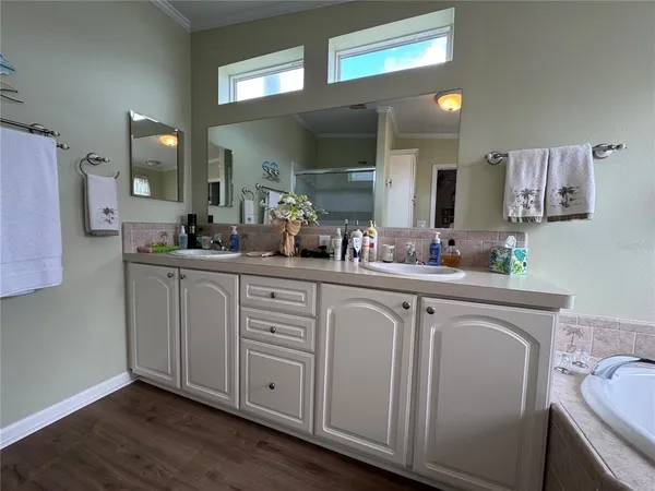 a bathroom with a toilet and a tub