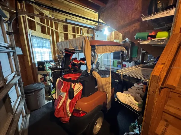 a view of balcony with furniture
