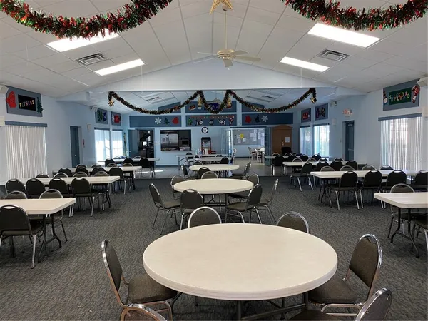 a view of a swimming pool with a lounge chairs