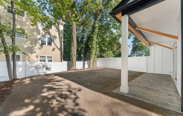 a view of a house with a street
