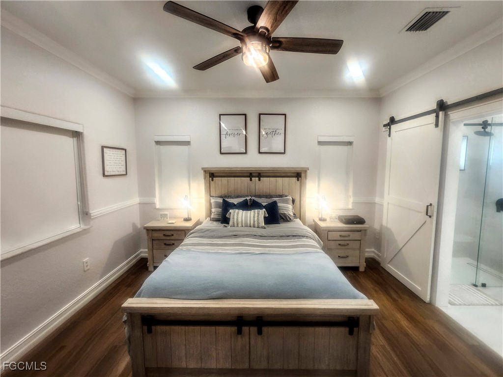 17833 Southwest 155th Court Miami, FL 33187 - Photo 10 of 22 a bedroom with a bed and window