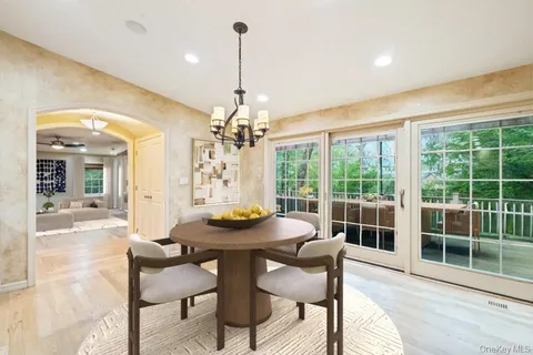 a bedroom with a bed and ceiling fan