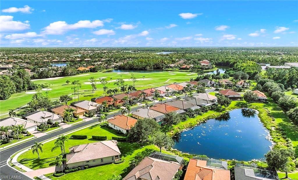 6082 Divot Court Naples, FL 34113 - Photo 2 of 39 a view of a city