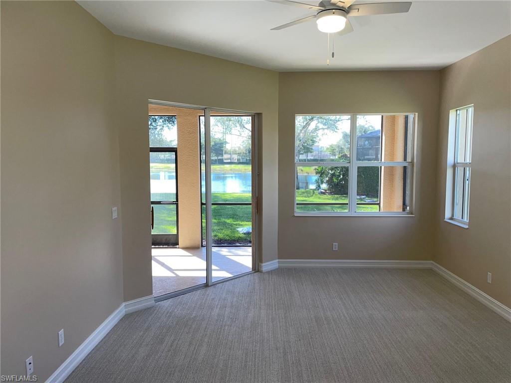 6082 Divot Court Naples, FL 34113 - Photo 21 of 39 an empty room with windows