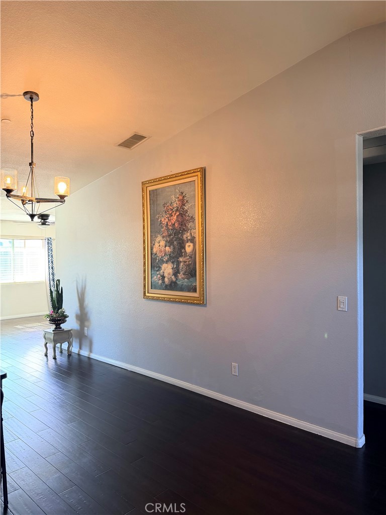 12833 Algonquin Road Apple Valley, CA 92308 - Photo 13 of 16 a view of a workspace with wooden floor