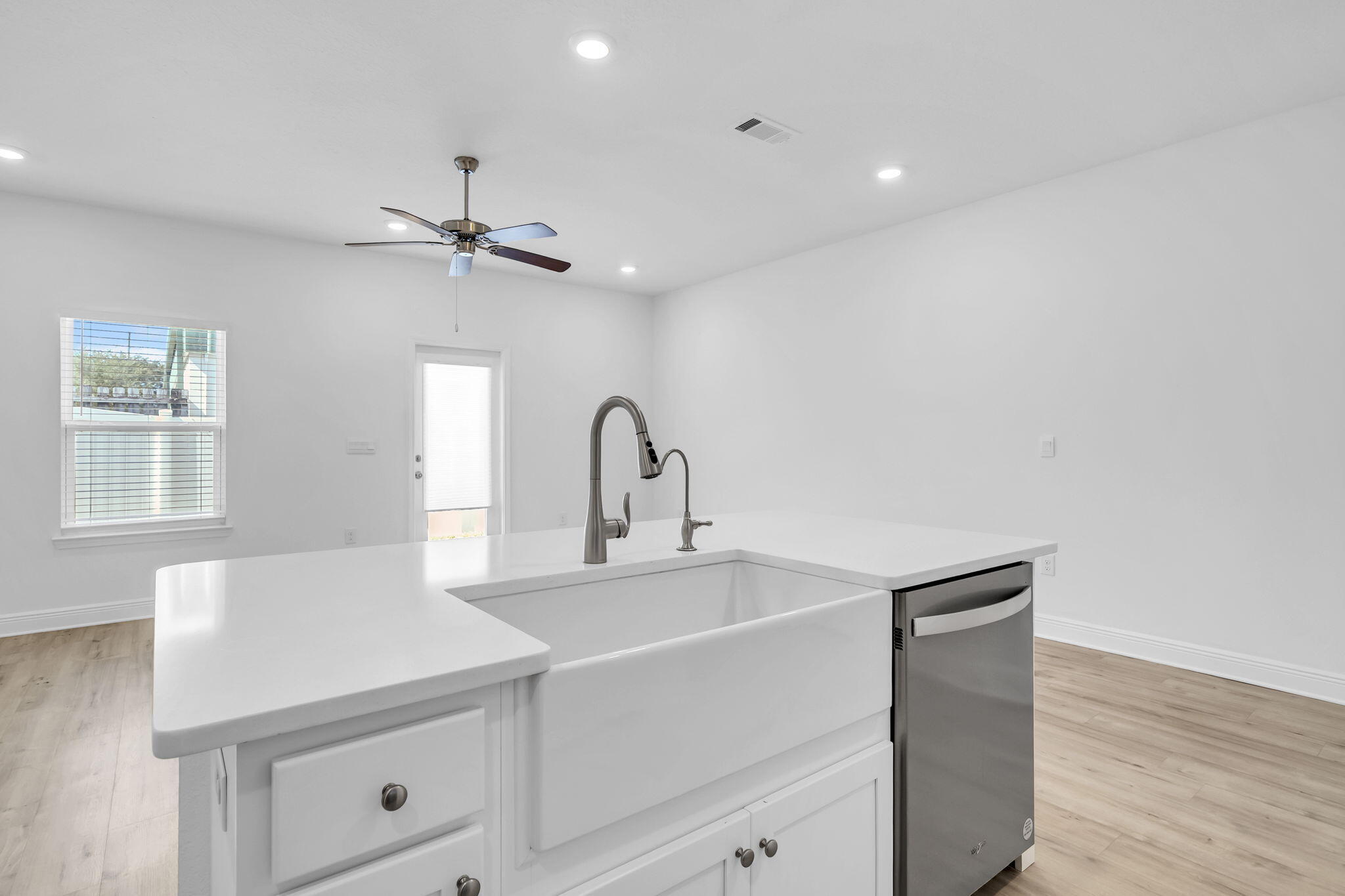 22 Redbird Loop Destin, FL 32541 - Photo 12 of 40 a kitchen with a sink and a refrigerator