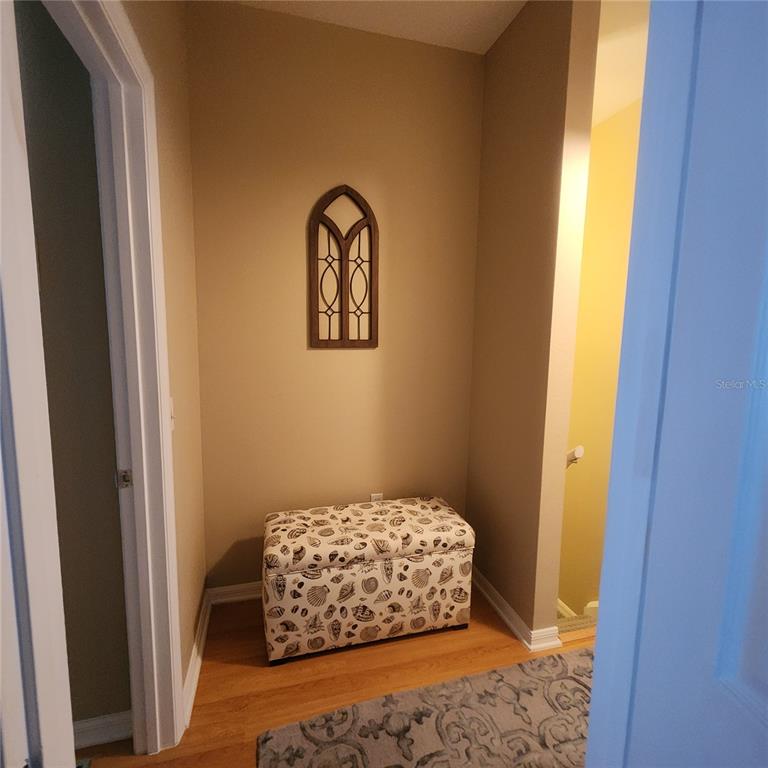 14982 Skip Jack Loop Lakewood Ranch, FL 34202 - Photo 19 of 28 a bedroom with a bed and a window