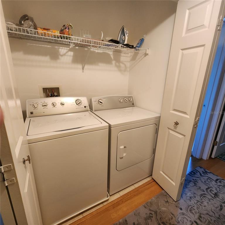 14982 Skip Jack Loop Lakewood Ranch, FL 34202 - Photo 24 of 28 a utility room with dryer and washer