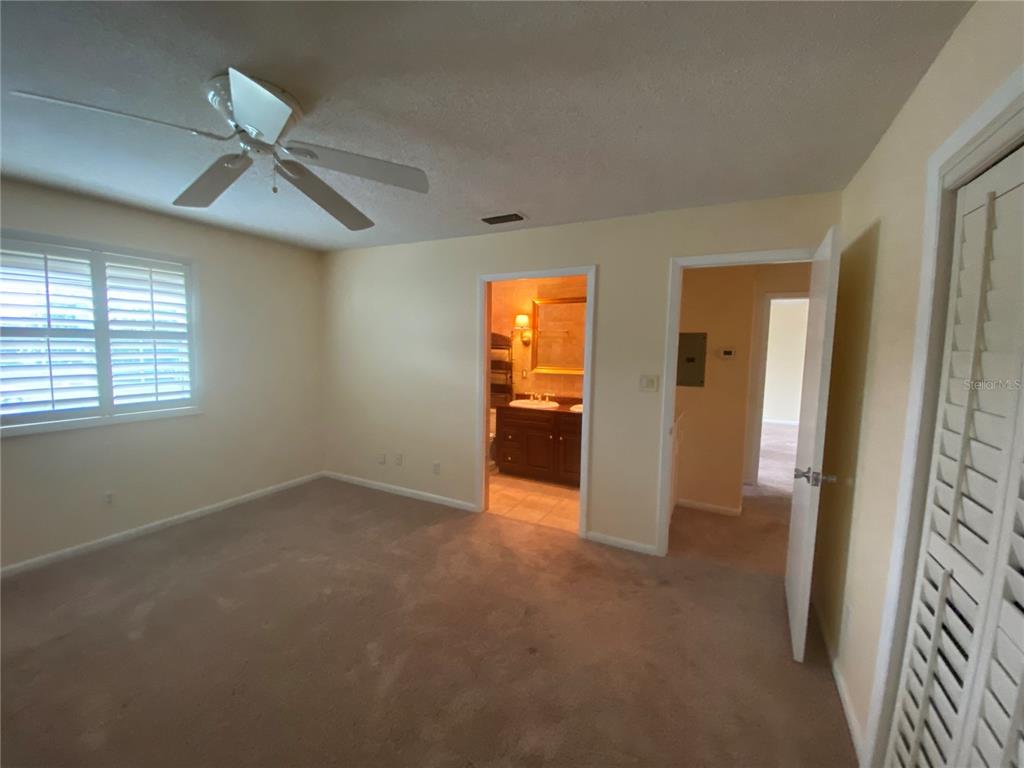 1500 Gay Road, Unit 17D Winter Park, FL 32789 - Photo 16 of 34 an empty room with closet and windows