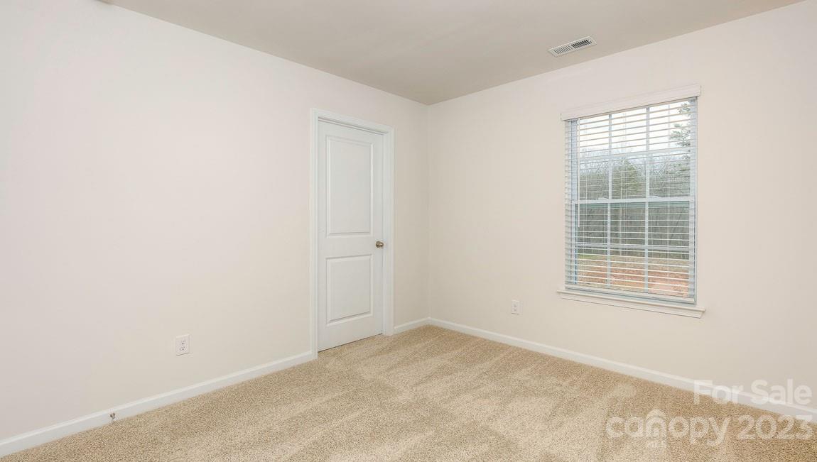 1603 Blue Velvet Lane Dallas, NC 28034 - Photo 11 of 17 an empty room with a window
