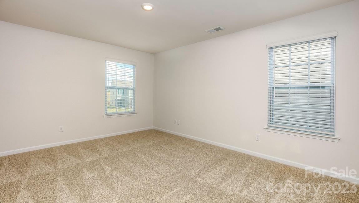 1603 Blue Velvet Lane Dallas, NC 28034 - Photo 14 of 17 an empty room with a window