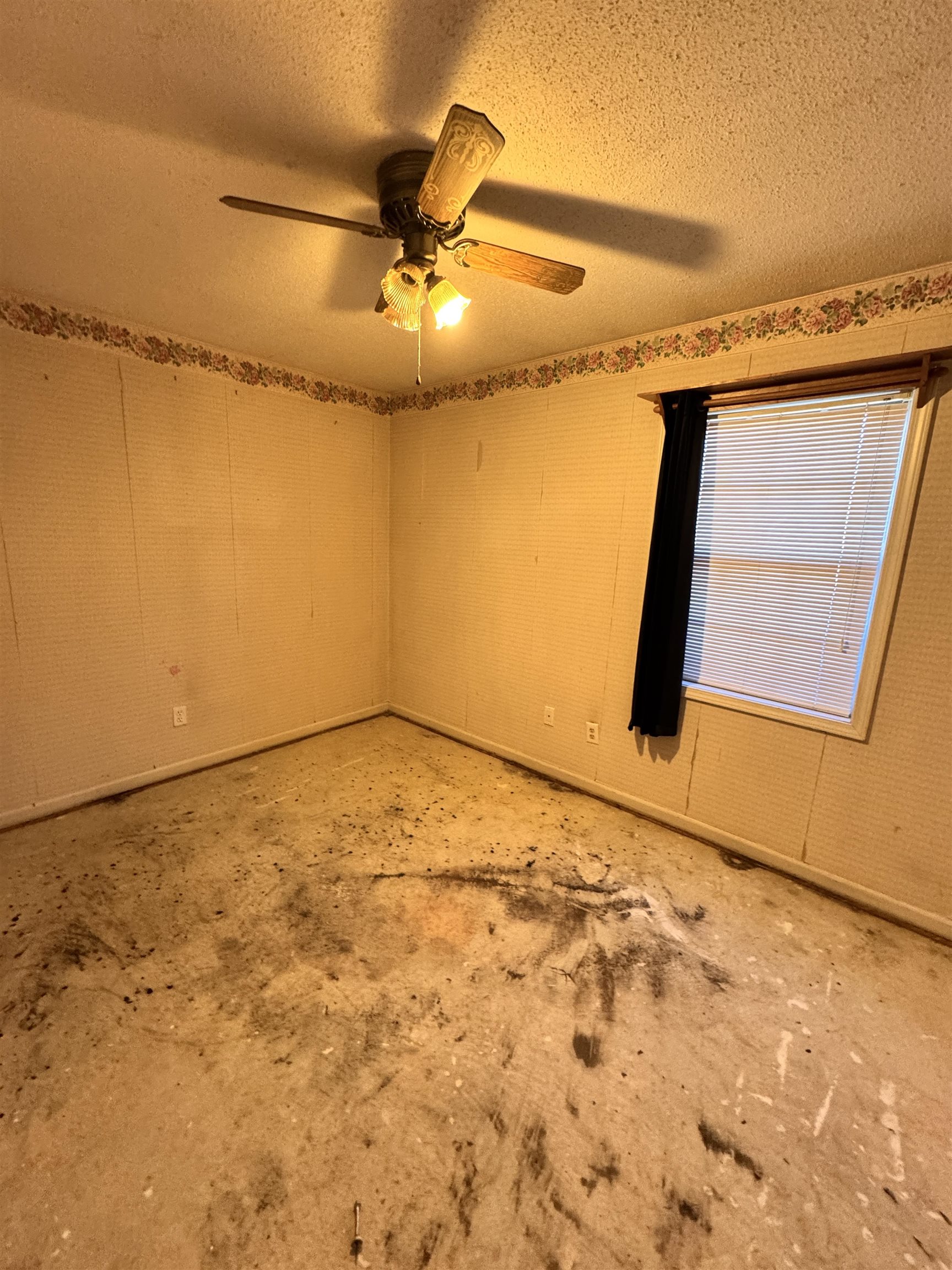 4777 Bill Knight Road Millington, TN 38053 - Photo 14 of 19 Spare room with a textured ceiling and a ceiling fan