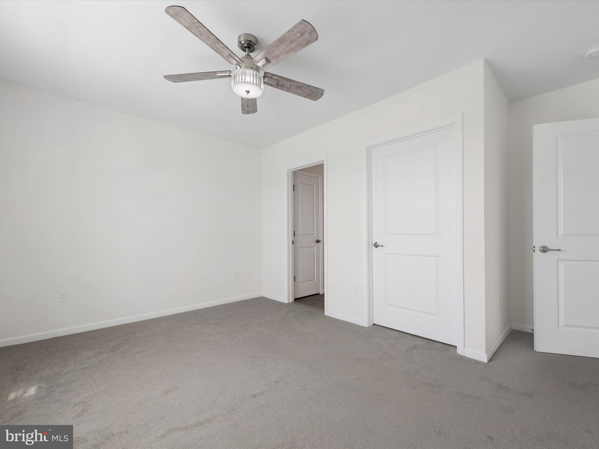 20141 Riesling Lane, Unit 401 Lewes, DE 19958 - Photo 14 of 49 Primary Bedroom 1