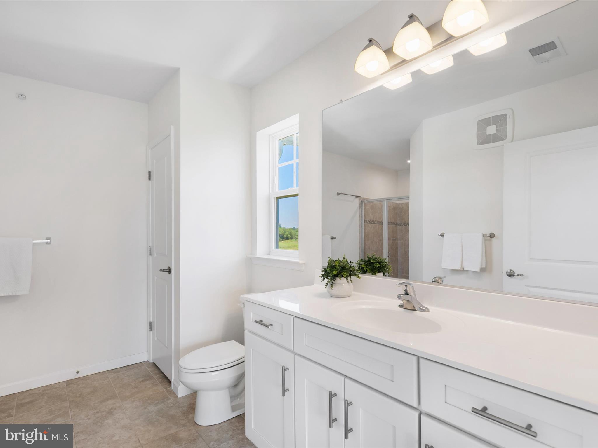 20141 Riesling Lane, Unit 401 Lewes, DE 19958 - Photo 19 of 49 Primary Bedroom 2 Ensuite